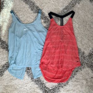 Set of Red and Blue Nike workout tops